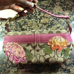 Coach with pink & embroidered flower detailing